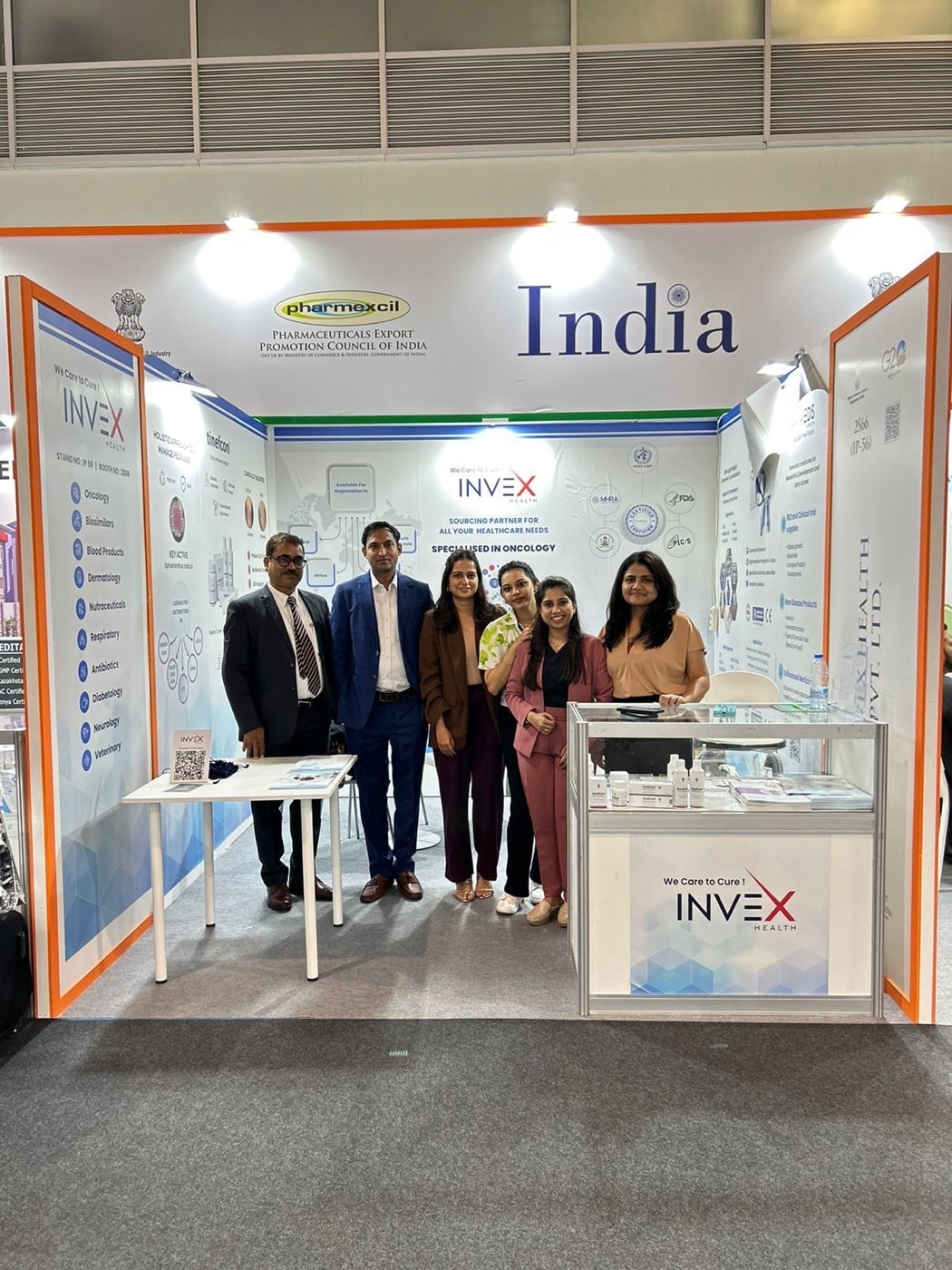 The Invex Health team at their CPHI Barcelona stand, under the India pavilion sign