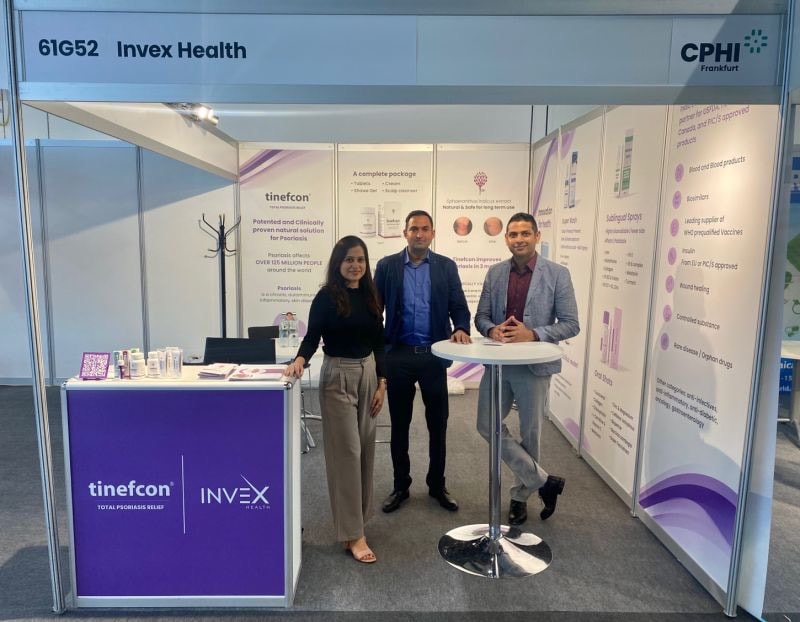 Visitors at the Invex Health stand at CPHI Frankfurt, beside its Tinefcon signage